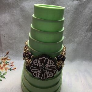 Elegant And Vintage Beaded Bracelet with Floral Accent By Monet